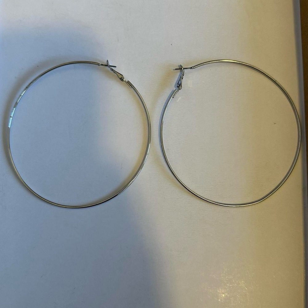 Vintage large silver tone hoop earrings.